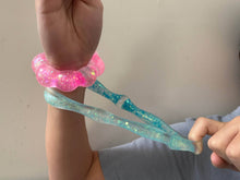 Load image into Gallery viewer, orange Feelzies™ Original Squishy Bracelet: Sunburst Orange fidget
